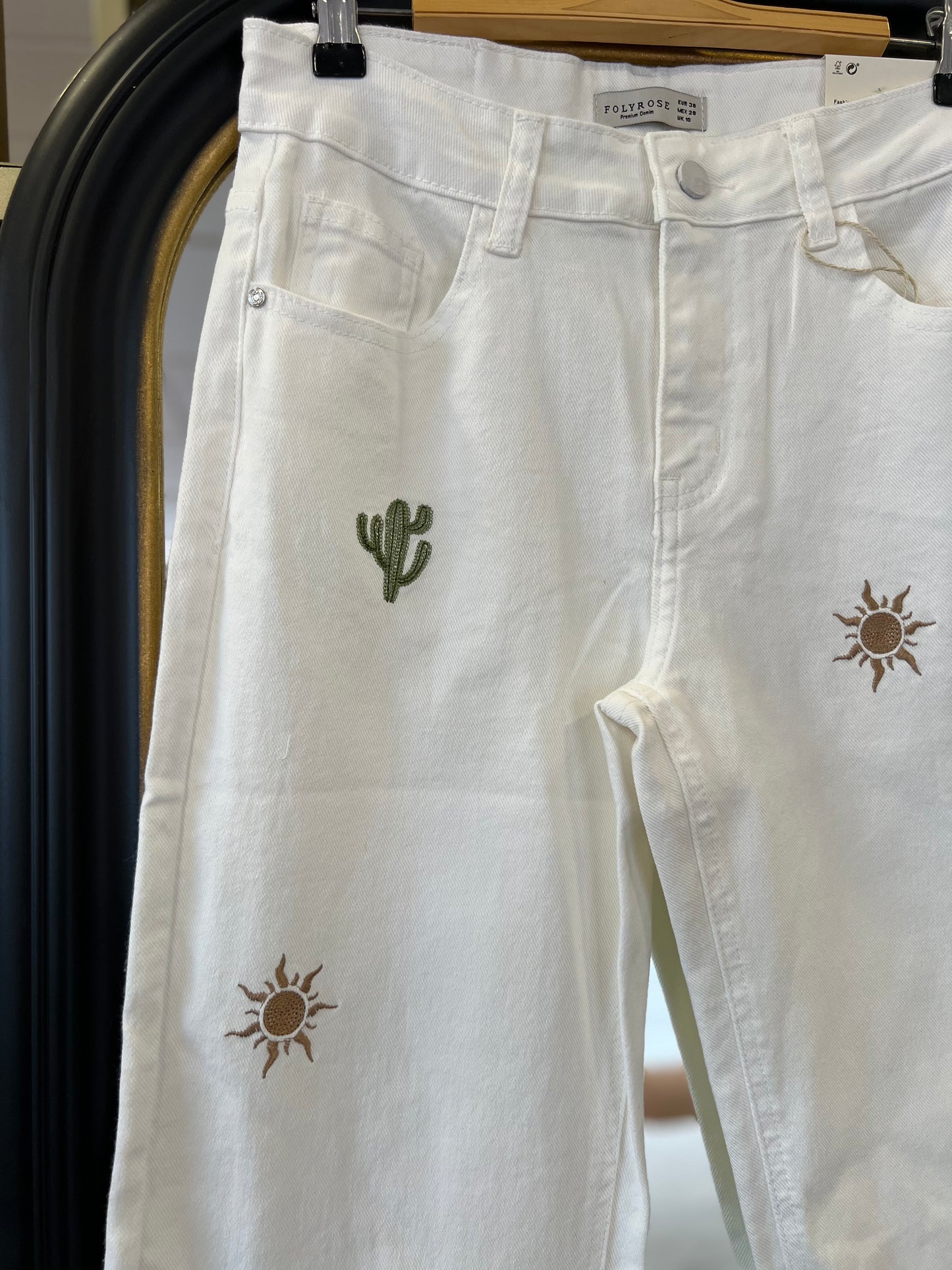 Pantalón beige dibujos