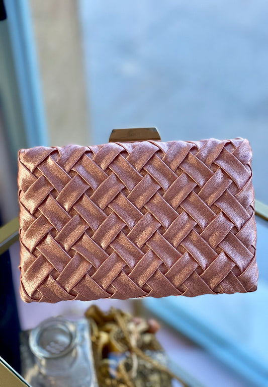 Cartera trenzada rosa