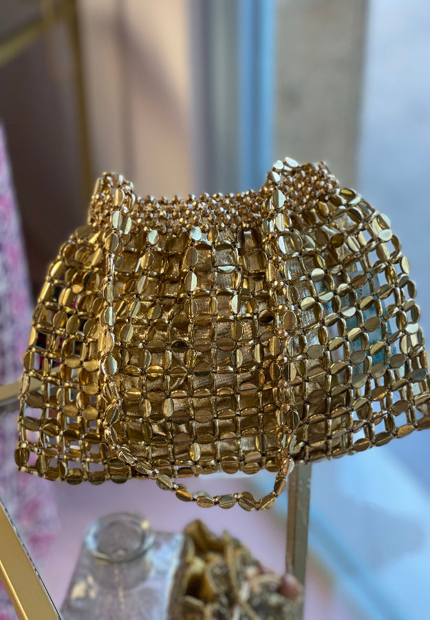 Bolso de mano dorado